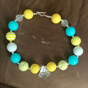 A blue and yellow necklace